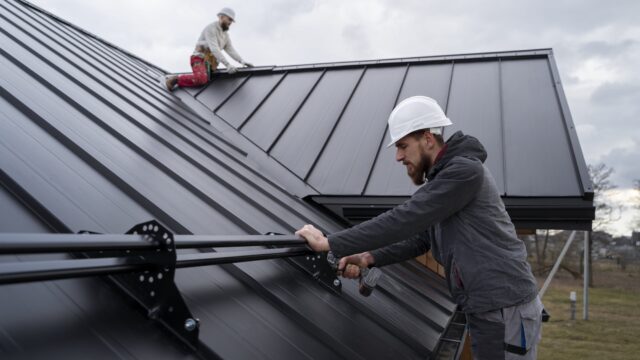 Permanent roof anchor installed on industrial metal roof