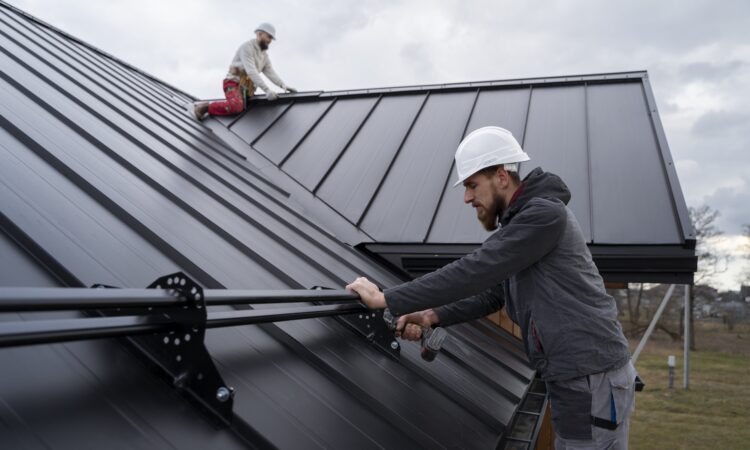 Permanent roof anchor installed on industrial metal roof